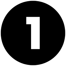 alt="A black circular sign with a white number one in the center."
